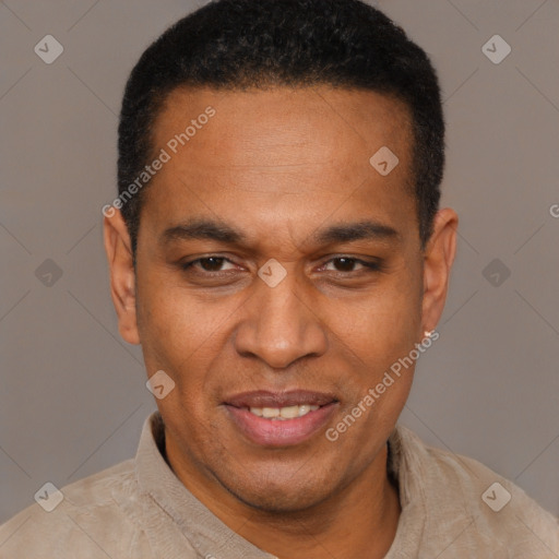 Joyful latino adult male with short  black hair and brown eyes