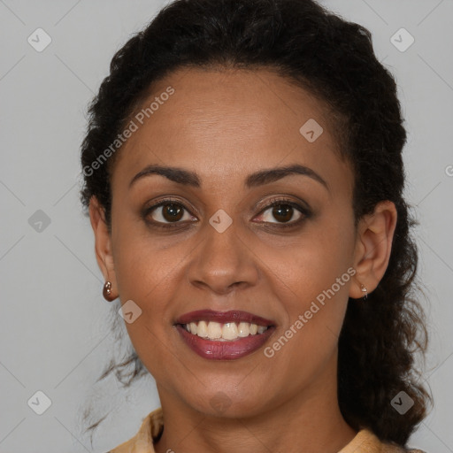 Joyful latino young-adult female with long  brown hair and brown eyes