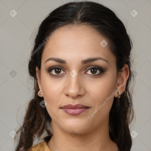 Joyful latino young-adult female with medium  brown hair and brown eyes