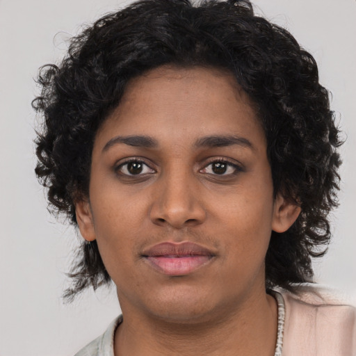 Neutral black young-adult female with long  black hair and brown eyes