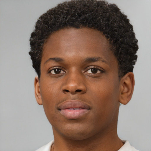 Neutral black young-adult male with short  brown hair and brown eyes