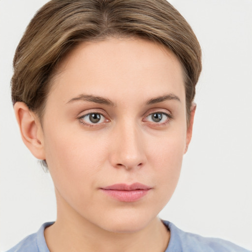 Neutral white young-adult female with short  brown hair and grey eyes