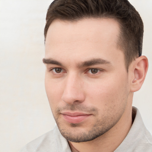 Neutral white young-adult male with short  brown hair and brown eyes