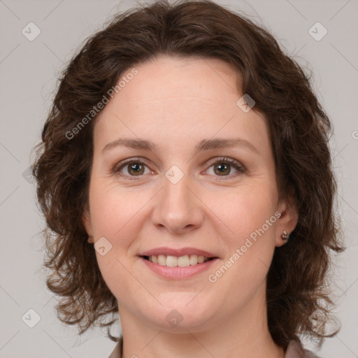 Joyful white young-adult female with medium  brown hair and green eyes