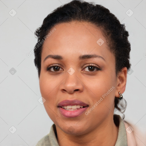 Joyful latino young-adult female with short  brown hair and brown eyes