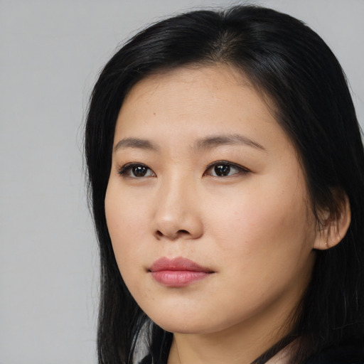 Neutral asian young-adult female with long  black hair and brown eyes