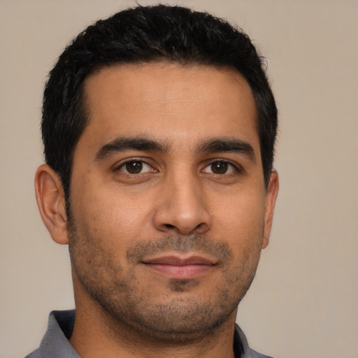 Neutral latino young-adult male with short  brown hair and brown eyes