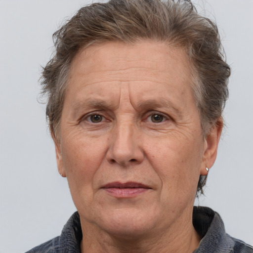 Joyful white middle-aged male with short  brown hair and brown eyes