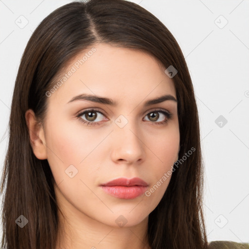 Neutral white young-adult female with long  brown hair and brown eyes