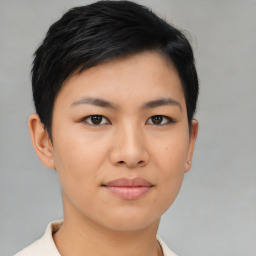 Joyful asian young-adult female with short  black hair and brown eyes