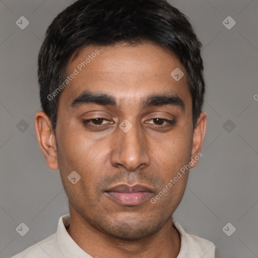 Neutral white young-adult male with short  black hair and brown eyes