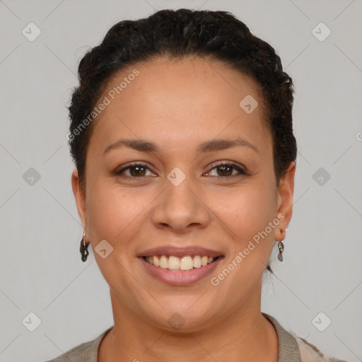 Joyful latino young-adult female with short  brown hair and brown eyes