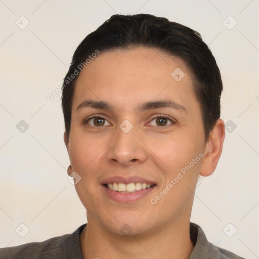 Joyful white young-adult female with short  brown hair and brown eyes