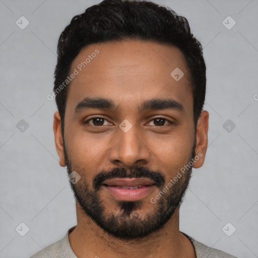 Joyful latino young-adult male with short  black hair and brown eyes