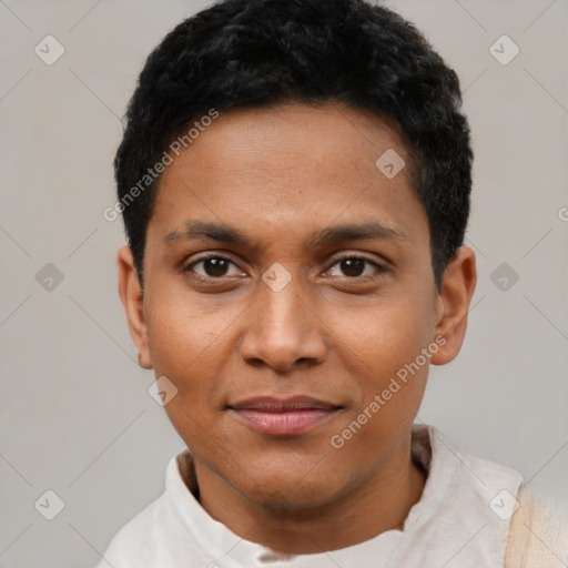 Joyful black young-adult male with short  black hair and brown eyes