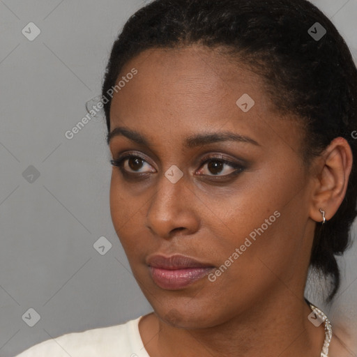 Neutral black young-adult female with short  brown hair and brown eyes