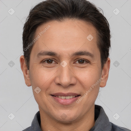 Joyful white adult male with short  brown hair and brown eyes