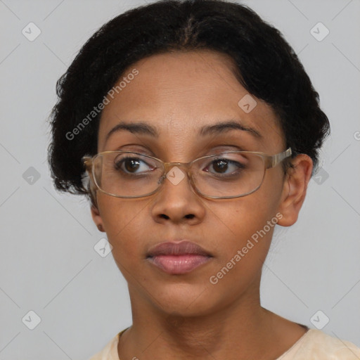 Neutral black young-adult female with short  brown hair and brown eyes