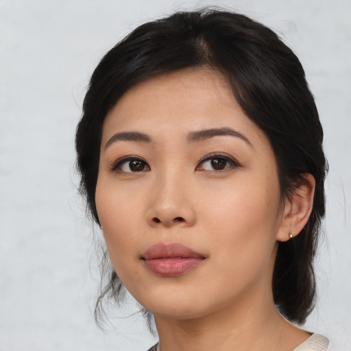 Neutral asian young-adult female with medium  black hair and brown eyes