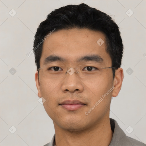 Neutral asian young-adult male with short  black hair and brown eyes