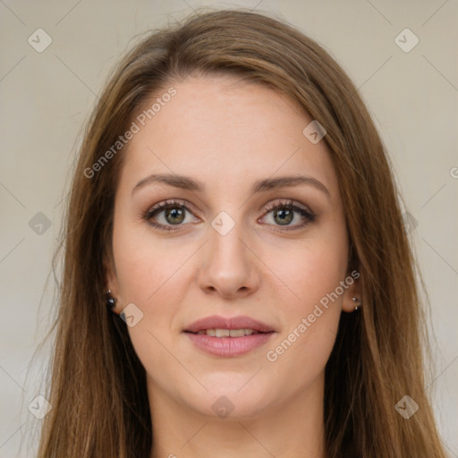 Joyful white young-adult female with long  brown hair and green eyes