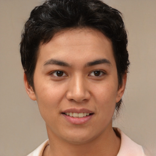 Joyful latino young-adult female with short  brown hair and brown eyes
