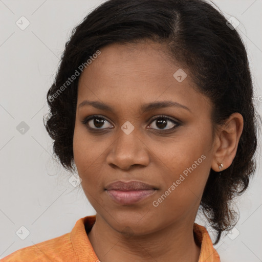 Joyful black young-adult female with medium  brown hair and brown eyes