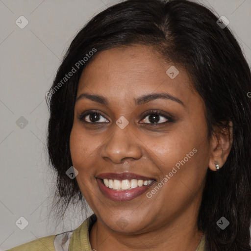 Joyful black young-adult female with medium  black hair and brown eyes