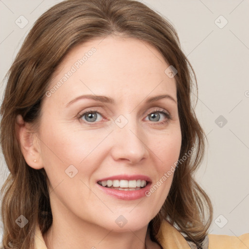 Joyful white young-adult female with medium  brown hair and blue eyes