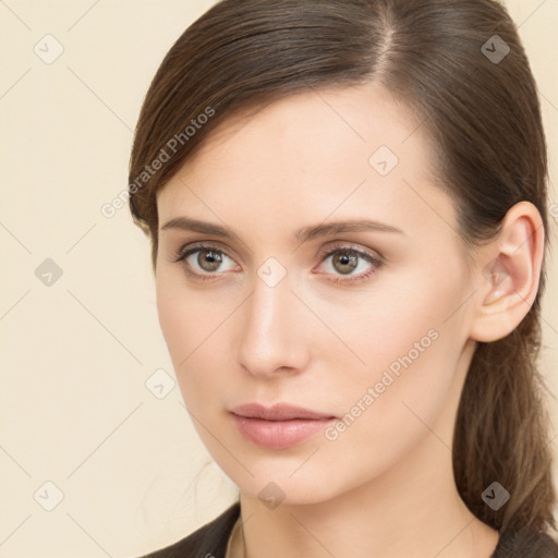 Neutral white young-adult female with long  brown hair and brown eyes