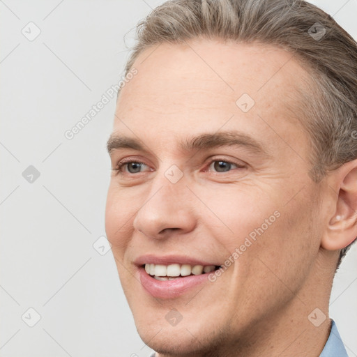 Joyful white adult male with short  brown hair and brown eyes