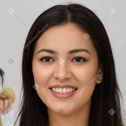 Joyful latino young-adult female with long  brown hair and brown eyes