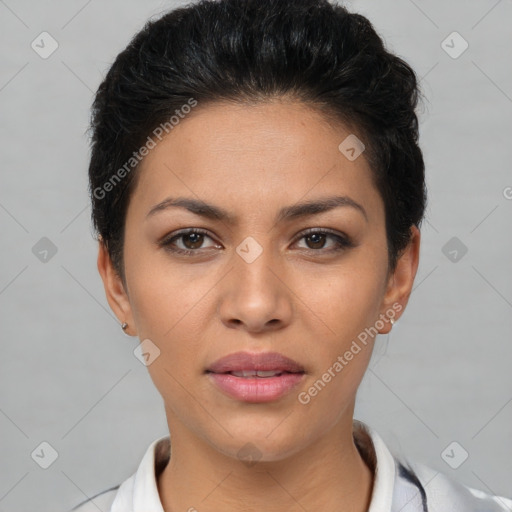 Joyful latino young-adult female with short  black hair and brown eyes