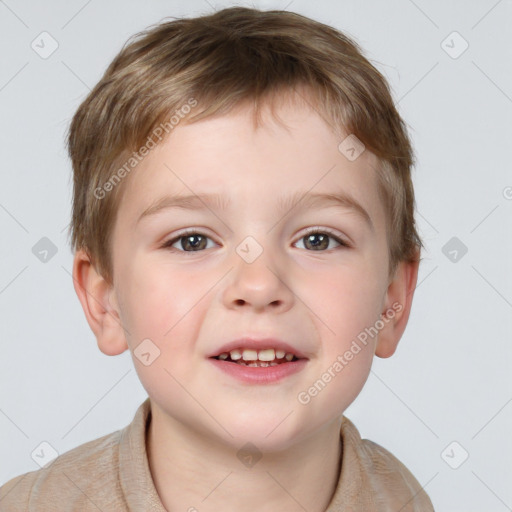 Joyful white child male with short  brown hair and brown eyes