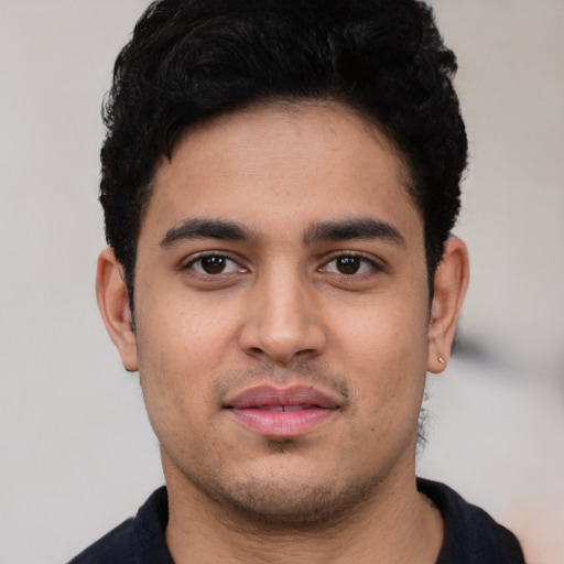 Neutral white young-adult male with short  black hair and brown eyes