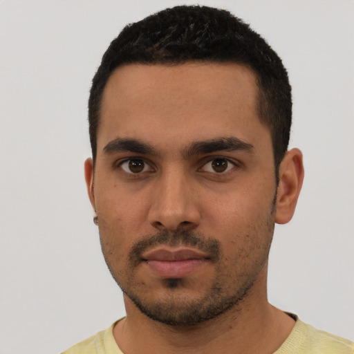 Neutral latino young-adult male with short  black hair and brown eyes