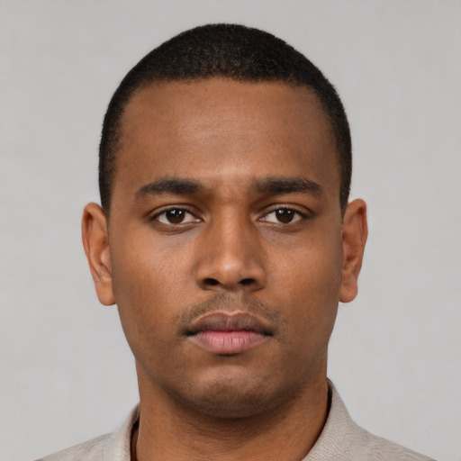 Neutral latino young-adult male with short  brown hair and brown eyes