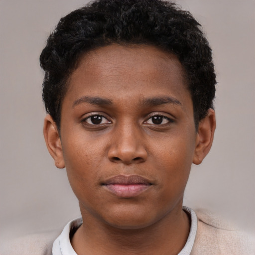 Neutral black young-adult female with short  brown hair and brown eyes
