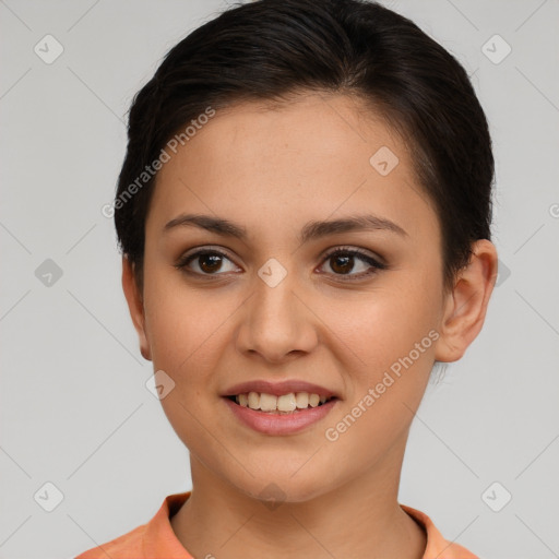 Joyful white young-adult female with short  brown hair and brown eyes