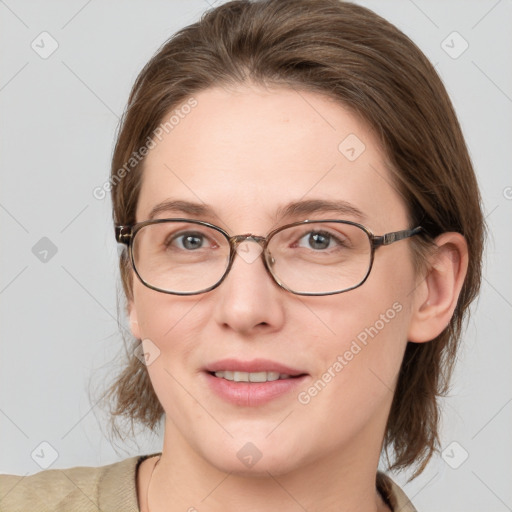 Joyful white young-adult female with medium  brown hair and blue eyes