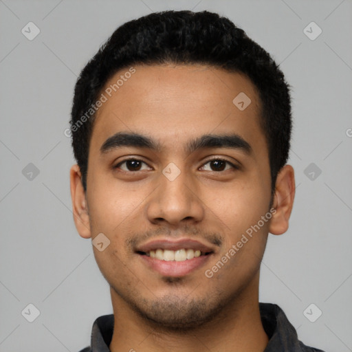 Joyful latino young-adult male with short  black hair and brown eyes