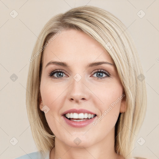 Joyful white young-adult female with medium  brown hair and blue eyes