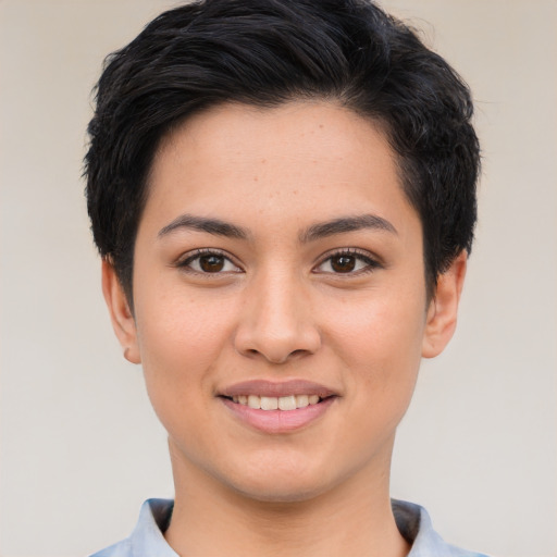 Joyful white young-adult female with short  brown hair and brown eyes