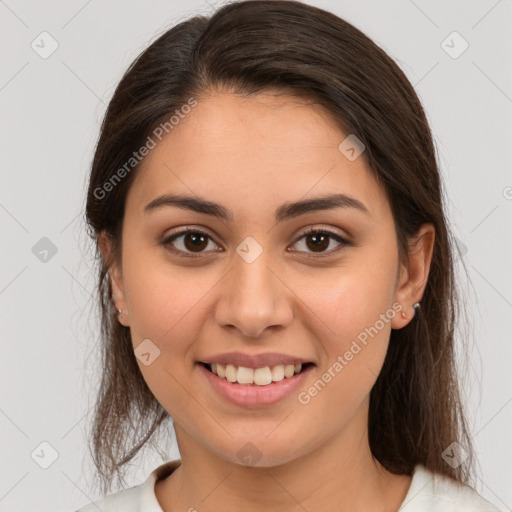 Joyful white young-adult female with medium  brown hair and brown eyes