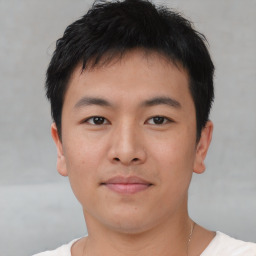 Neutral asian young-adult male with short  black hair and brown eyes