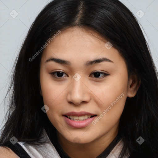 Joyful asian young-adult female with long  brown hair and brown eyes