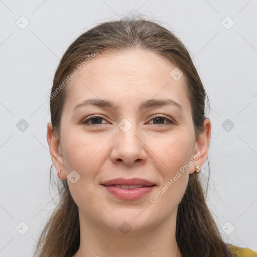 Joyful white young-adult female with long  brown hair and grey eyes