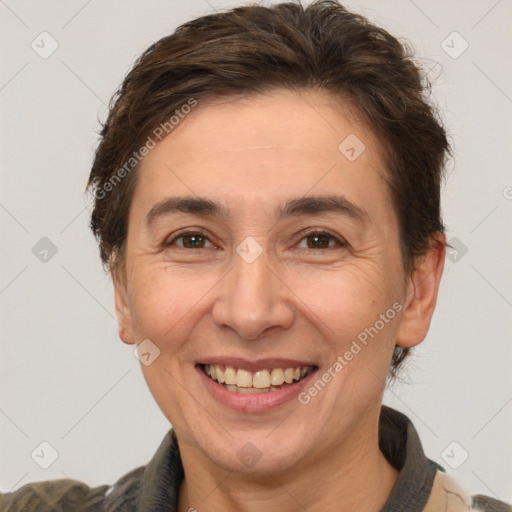 Joyful white adult female with short  brown hair and brown eyes