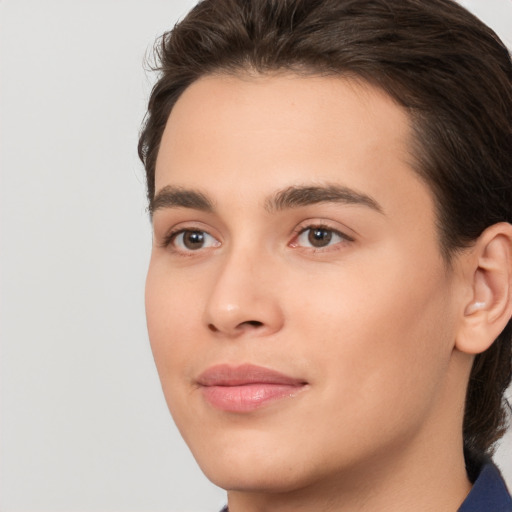 Joyful white young-adult male with medium  brown hair and brown eyes