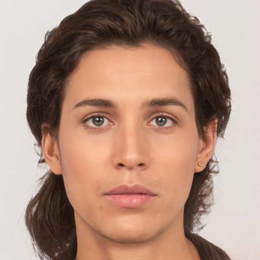 Neutral white young-adult female with medium  brown hair and brown eyes